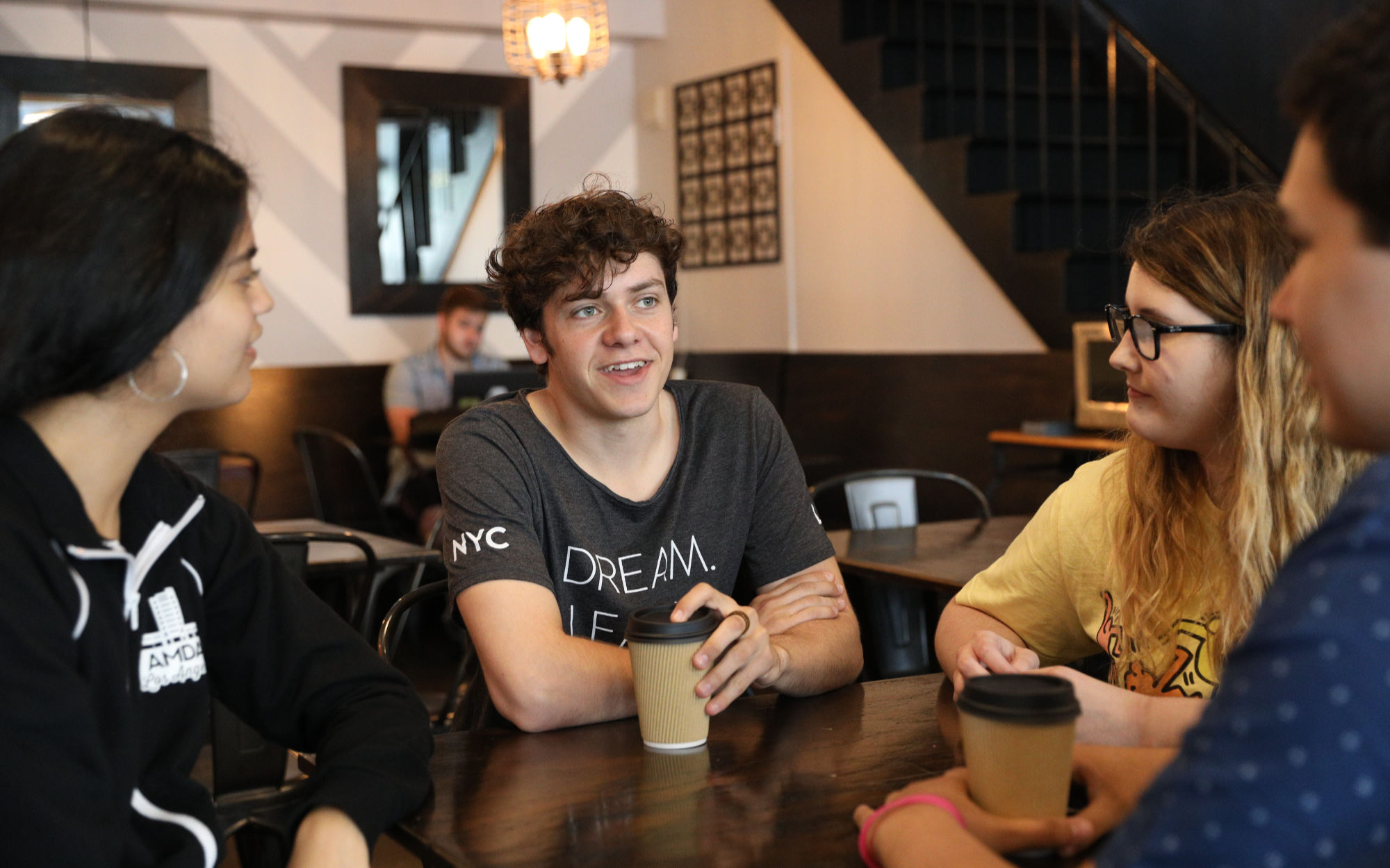 Students talking in café