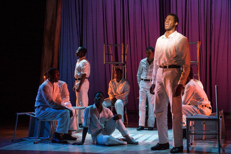 Kyle Scatliffe (standing, right) in The Scottsboro Boys